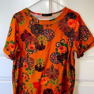 2 Colorful tops. Cotton. Washed once but never worn. Size is large.